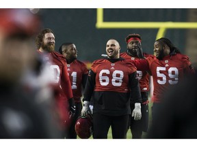 The Calgary Stampeders' Justin Lawrence (centre #68) takes part in a team practice at Commonwealth Stadium, in Edmonton Friday November 23, 2018. The Stampeders will face the Ottawa Redblacks in the Grey Cup this Sunday. Photo by David Bloom