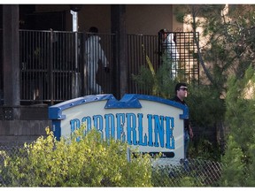 Investigators work at the scene of a mass shooting at the Borderline Bar & Grill in Thousand Oaks, Calif., on Thursday.