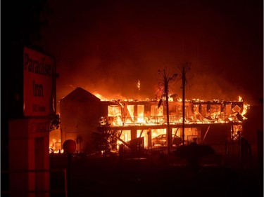 The Paradise Inn hotel burns as the Camp Fire tears through Paradise, north of Sacramento, California on Nov. 08, 2018. More than 100 homes, a hospital, a Safeway store and scores of other structures have burned in the area.