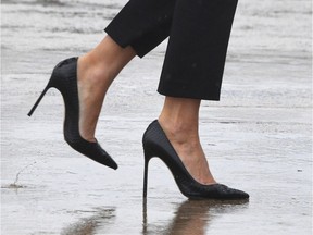 To prevent injuries, women should not be forced or coerced to wear high heels on the job, says a Calgary physician.