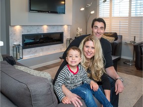 Steve and Megan Berman with their son Jack in their house by Cedarglen Homes at the Rise at West Grove Estates.