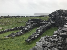 A visit to Black Fort on Inishmore, Galway County, in the rain is enough to make anyone appreciate the simple things in life – like good shoes and a rain coat. The ruins are said to be over 3000 years old. Photo, Joanne Elves