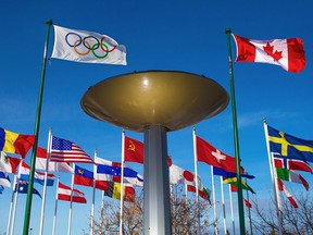 The flags and Olympic cauldron at Canada Olympic Park in Calgary.