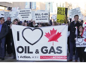 About a thousand Calgarians protested the lack of pipelines outside the Telus Convention Centre on Tuesday November 27, 2018.
