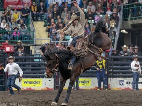 Clay Elliott rides to victory at the Canadian Finals Rodeo on Sunday in Red Deer.