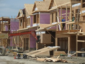 Homes under construction in northeast Calgary in 2014. Household debt has been a key concern for the Bank of Canada as it gradually raises its trend-setting interest rate.