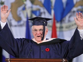 Murray McCann, Calgary business leader and philanthropist, gestures during his speech to graduates as he received an honorary Bachelor of Nursing degree from Mount Royal University in Calgary on Friday, November 2, 2018. Jim Wells/Postmedia