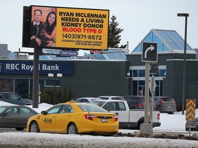 The giant black and yellow digital signs around the city went up earlier this month, stating in all capital letters that "Ryan Mclennan needs a living kidney donor" who has blood type O. Al Charest/Postmedia