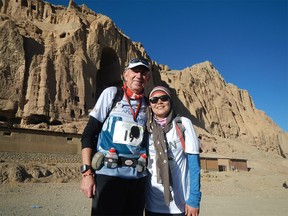 Canada’s Marathon Man, Martin Parnell, from Cochrane, Alberta, and a 25-year-old Afghan woman called Kubra, took part in 42-kilometre marathon in Afghanistan. The race, which took place in Bamiyan, a town about 140 kms northwest of the capital Kabul, was kept super-secret, because last year locals tried to stone a women running in it. Parnell took part to raise money for Right to Play.  Credit:  ?????  //