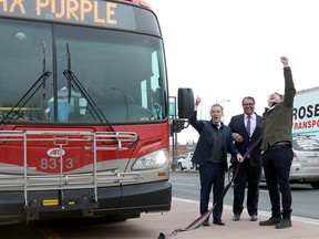 From left: Federal Minister of Infrastructure & Communities Francois-Philippe Champagne, Mayor Naheed Nenshi and Ward 9 Coun. Gian-Carlo Carra cheer on the three new MAX lines that will begin on Monday.