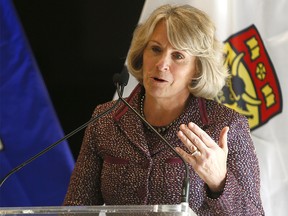 Elizabeth Cannon, president and vice-chancellor, University of Calgary speaks as Premier, Rachel Notley announced an investment in the University of Calgary by transferring the University Research Park to the University of Calgary at the CMG Building in Calgary on Thursday November 15, 2018. Darren Makowichuk/Postmedia