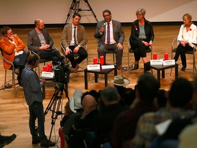 From left to right, David Finch, Trevor Tombe, Coun. Evan Woolley, Mayor Naheed Nenshi, Jeanne Milne and Mary Moran during a town hall at the new downtown Calgary Public Library on Wednesday, November 7, 2018.