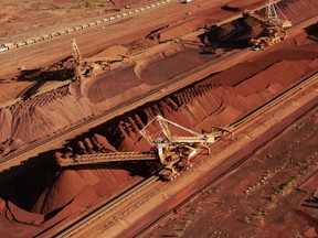 An undated handout photo released by BHP Billiton shows iron ore being stockpiled for export at Port Hedland in Western Australia.