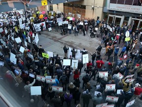 Hundreds of energy and pipeline supporters gather outside the Telus Convention Centre on Monday Nov. 27, 2018, where Finance Minister Bill Morneau was speaking to the Calgary Chamber of Commerce.