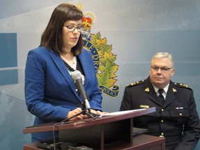 Alberta Justice Minister Kathleen Ganley and Alberta RCMP Acting Commanding Officer John Ferguson announce a new phone centre initiative in Calgary on Tuesday, Nov. 13, 2018.