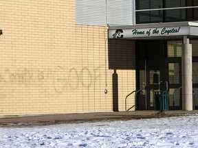 Staff and students at Centennial High School in southeast Calgary showed up Wednesday morning to find that their school had been vandalized. Someone had spray painted profanities all over the outer walls of the building.