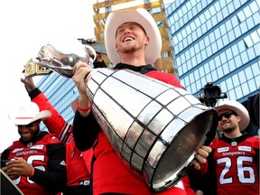 Calgary Stampeders QB, Bo Levi Mitchell with the cup as thousands of fans came out as the City of Calgary held a rally to celebrate the Calgary Stampeders' victory in the 106th Grey Cup, a 27-16 win over the Ottawa RedBlacks in Calgary on Tuesday November 27, 2018. Darren Makowichuk/Postmedia