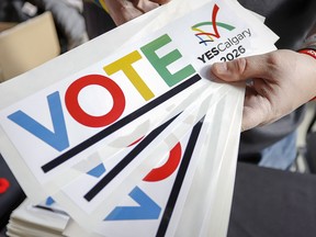 Bumper stickers in support of the 2026 Winter Olympic bid. The Herald's editorial board supports a Yes vote on Tuesday to bid for the 2026 Olympic and Paralympic Games.