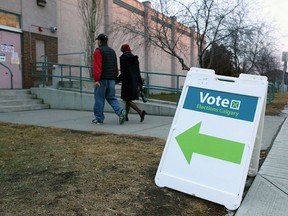 Calgarians head in to cast their vote on the 2026 Olympic bid at Mount View School in Winston Heights on Tuesday, Nov. 13, 2018.