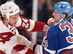 Red Wing forward Bob Probert and Oiler's Marty McSorley fight in 1989.