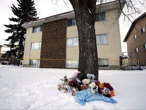 A memorial for two children outside an apartment building at 7920 71 Street, in Edmonton Friday Dec. 7, 2018. Photo by David Bloom