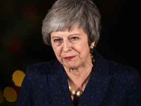 Britain's Prime Minister Theresa May makes a statement outside 10 Downing Street in central London after winning a confidence vote on December 12, 2018. (Photo by Oli SCARFF / AFP)OLI SCARFF/AFP/Getty Images