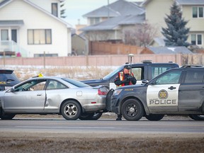 The Alberta Serious Incident Response Team investigates after officer-involved shooting on McKnight Boulevard between 68th Street N.E. and Stoney Trail in Calgary on Christmas Day. Al Charest/Postmedia