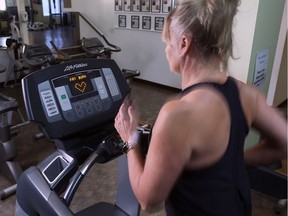 Fitness instructor Helen Vanderburg writes about the myth of the "fat burning" workout in her latest column. Vanderburg was photographed demonstrating the fat burn setting on a treadmill on Thursday December 19, 2018.  Gavin Young/Postmedia