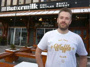 Sam Friley, owner of Buttermilk Fine Waffles, said his business was hit hard by a massive property tax hike and ongoing road closures for the 17th Avenue revitalization project, driving away business from the normally busy stretch of shops and eateries. Friley poses at his 17 Ave S.W. location in Calgary on Sunday, December 30, 2018.