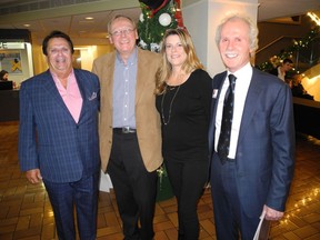 Pictured at the Dec. 1 performance of Theatre Calgary's A Christmas Carol are, from left: Tim Down, Master Chocolat's Bernard Callebaut and Karin Benson and Gordie Hoffman. This night took on special  meaning as more than 400 schoolchildren were treated to a free performance as well as the welcome surprise of  goodies galore.