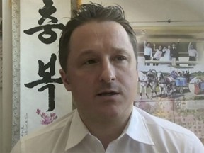 In this image made from video taken on March 2, 2017, Michael Spavor, director of Paektu Cultural Exchange, talks during a Skype interview in Yangi, China. A second Canadian man is feared detained in China in what appears to be retaliation for Canada's arrest of a top executive of telecommunications giant Huawei. The possible arrest raises the stakes in an international dispute that threatens relations. Canada's Global Affairs department on Wednesday, Dec. 12, 2018, said Spavor, an entrepreneur who is one of the only Westerners to have met North Korean leader Kim Jong Un, had gone missing in China. Spavor's disappearance follows China's detention of a former Canadian diplomat in Beijing earlier this week. (AP Photo) ORG XMIT: TKSK301