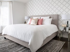 The master bedroom in a Priddis renovation by DWK Interiors.