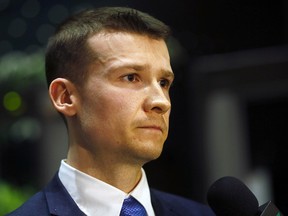 Ward 11 Coun. Jeromy Farkas speaks to media after being ejected from council chambers in Calgary on Monday, Dec. 17, 2018.