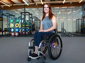 Kara Douville poses for a photo in the Performance Training Centre at Winsport gym. Douville's family and friends are hoping to raise $16,000 needed to buy her a handcycle so she can pursue her bid to become an Olympian.Friday, December 28, 2018. Dean Pilling/Postmedia