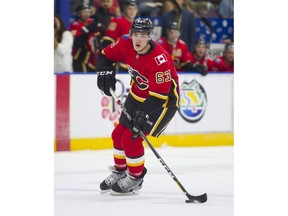 PENTICTON,BC:SEPTEMBER 10, 2017 -- Calgary Flames Adam Ruzicka skates with the puck during NHL preseason hockey action against the Vancouver Canucks at the Young Stars Classic held at the South Okanagan Events Centre in Penticton, BC, September, 10, 2017. (Richard Lam/PNG) (For ) 00050536A