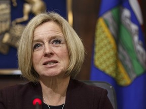 Alberta Premier Rachel Notley speaks to cabinet members about an 8.7 percent oil production cut to help deal with low prices, in Edmonton on Monday December 3, 2018.