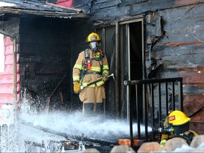 Calgary firefighters knocked down a fire at the back of a home on the 8000 block of Centre St. North on Sunday morning December 9, 2018. Gavin Young/Postmedia