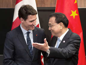 Prime Minister Justin Trudeau meets with Chinese Premier Li Keqiang in Singapore on Nov. 14, 2018.