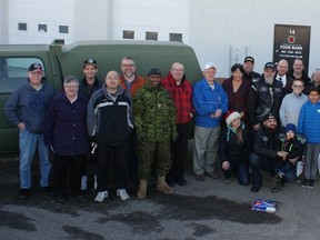 Those associated with the Veterans Association Food Bank are seen in a handout photo. Volunteers handed out 71 hampers to veterans on Dec. 22, 2018, the first time the association has done so.