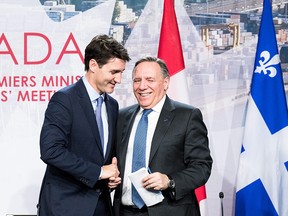 Prime Minister Justin Trudeau appears with Quebec Premier Francois Legault at last week's first ministers meeting in Montreal.