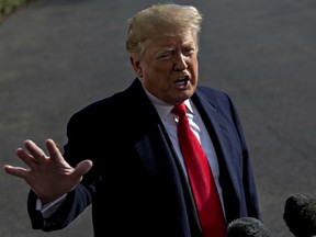 U.S. President Donald Trump speaks to members of the media before boarding Marine One on the South Lawn of the White House in Washington, D.C., U.S., on Thursday, Nov. 29, 2018. Trump asserted on Monday that the hushed-up payments to women alleging extramarital affairs were not illegal campaign contributions.