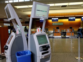 Westjet ticket area at the Calgary International Airport. WestJet Airlines Ltd. says it is complying with a probe by Canada's competition watchdog following accusations of predatory pricing from a competitor.