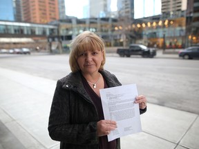 Sheila Griffith, who runs a ranching operation with her husband, holds her letter to Notley and Trudeau outside her office in Calgary, on Wednesday January 2, 2019, about her refusal to pay carbon tax because they have failed to get the trans Mountain pipeline through. Leah Hennel/Postmedia