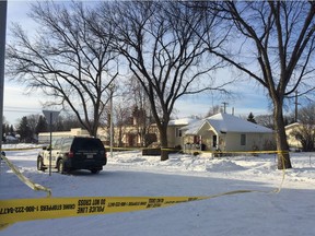 Edmonton, Jan. 19, 2019 ó Police vehicles are seen Saturday outside a home near 61 Street and 120 Avenue, where police say a woman was killed following an alleged home invasion. Photo by Anna Junker