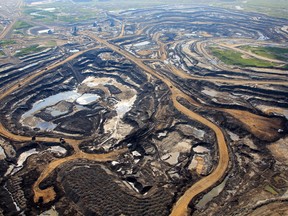 An aerial view of Canadian Natural Resources Limited (CNRL) oilsands mining operation near Fort McKay, Alta.