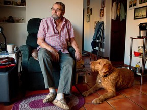 Stan Parsons, 84, pictured at his home in Calgary, has to find a new place to live by the end of February. The senior, who is on a fixed income, says he hasn't been able to find anywhere affordable that will accept pets the size of his dog Jellybean.