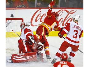 Calgary Flames Sam Bennett scores on Detroit Red Wings goalie Jimmy Howard in NHL hockey action at the Scotiabank Saddledome in Calgary, Alta. on Friday January 18, 2019. Leah Hennel/Postmedia