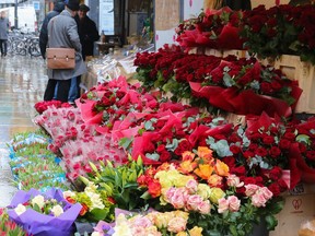Bunches of roses on display in this file photo taken in London.