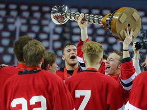 The St. Albert Raiders celebrate after winning the Mac's AAA Midget hockey final at the Scotiabank Saddledome in Calgary on Jan. 1, 2019. With Hockey Canada dropping the term "midget," the tournament's naming could see changes moving forward.