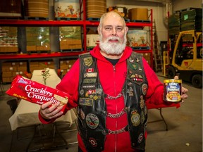 Dan McLean, retired Air Force captain and vice-president of the Veterans Association Food Bank, poses for a photo during the launch the new Veterans Association Food Bank in Calgary on Sunday. Photo by Al Charest/Postmedia.